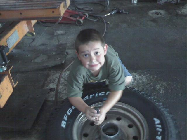 Devin at the shop - helping Daddy