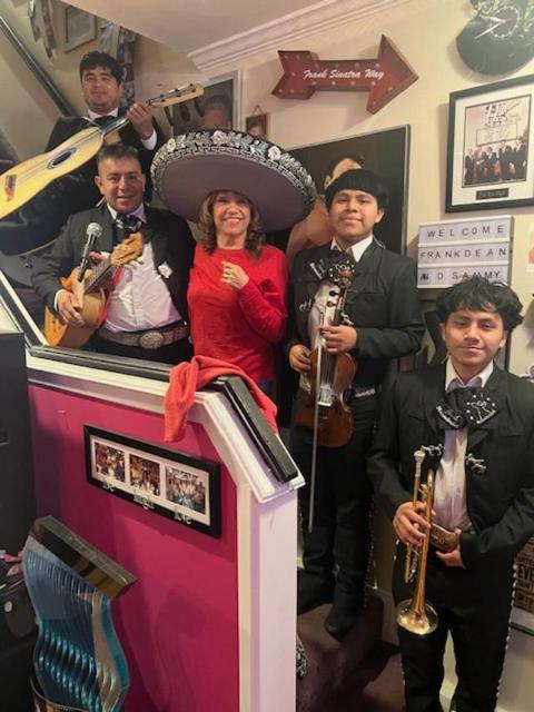 eva 79 with mariachis at home